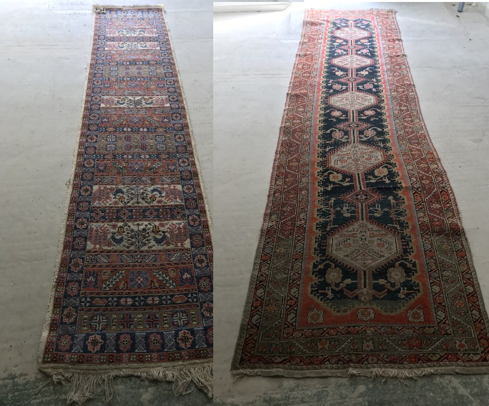 C20th machine made wool runner with geometric pattern, flowers & creatures on a blue & orange ground