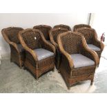 Set of 8 rattan arm chairs with blue & white cushions (some wear)