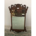 Small Georgian style mahogany wall mirror with carved surround