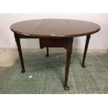 C19th small mahogany oval drop leaf dining table on pad feet 106 x 108 cm