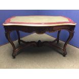 C19th French mahogany carved & gilt metal mounted serpentine edged table with inset leather top