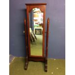 Modern cheval mirror opening to enclosed jewellery storage area