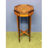 Marquetry kettle stand with a central motif of a flower, possibly Italian