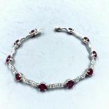 Ruby & diamond tennis bracelet set in gold