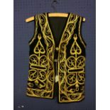 Mid C20th Indian waistcoat decorated with gold thread on a black ground