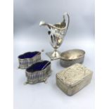 Collection of sterling silver items to include Georgian cream jug on square base & embossed silver