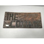 African sign on hardwood 'The Cottage'