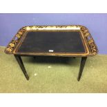 Japanned & gilt metal tray on a stand 77 x 56 x 48 cm