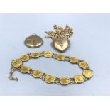Yellow metal bracelet of Oriental design marked 20, together with 2 9ct gold back & front locket 19g