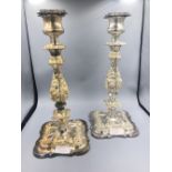 Pair of heavy white metal candlesticks