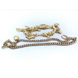 Yellow metal charm bracelet set with 9ct gold charms, & unmarked yellow metal curb link watch chain