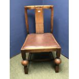 Wooden chair with brown drop in seat