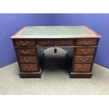 Mahogany knee hole pedestal desk with green tooled leather top 120 cm wide