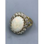 18ct Diamond & opal cluster ring size M