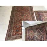2 early C20th Middle Eastern rugs for restoration both with geometric patterns 210 x 127 cm & 112