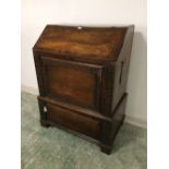 Unusual carved mahogany bureau converted to internal mirrored drinks cupboard