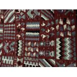 2 Modern red ground rugs 217 x 143 & 127 x 75 cm