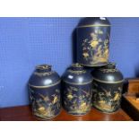 3 Dark blue & 1 black tea canisters decorated with flowers & birds