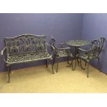 Green painted iron circular garden table & chairs & 2 seater bench