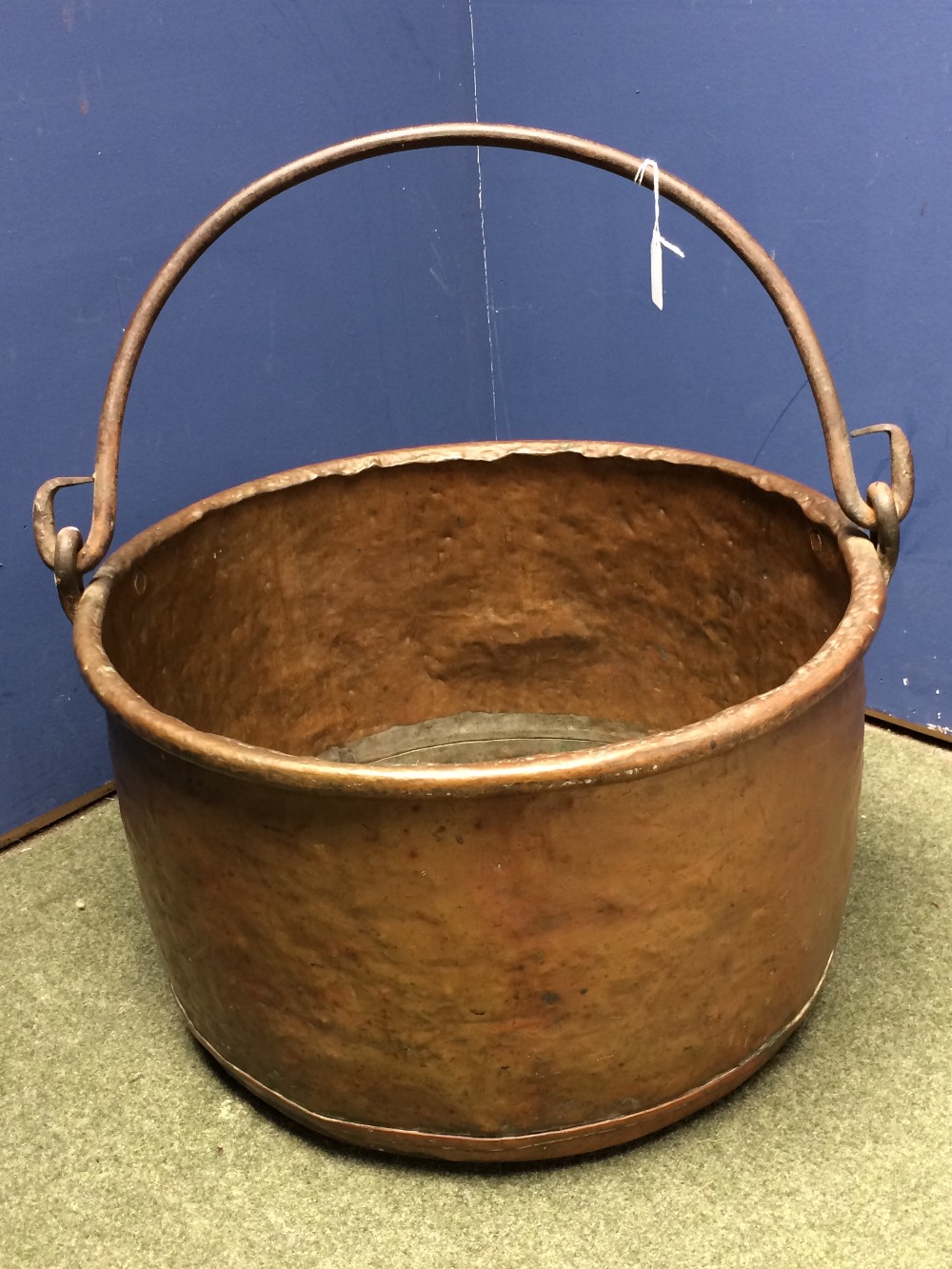 Large copper jardiniere with hooped carrying handle