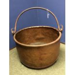 Large copper jardiniere with hooped carrying handle
