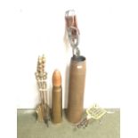 Large (64 x 16cm) brass shell case, 2 shooting sticks, fire irons & a trivet. 1917 shell case (42cm)