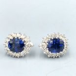 Diamond & sapphire ear studs set in gold (approx 6ct sapphire)