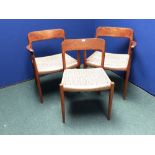Pair of contemporary armchairs with lattice work seat & a single chair