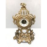 Decorative mantel clock with 2 gilt figures of a lady & a man 36 x 25 cm