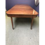 Victorian mahogany extending oblong dining table with 3 extra leaves on square tapering legs to