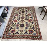 Good quality oatmeal ground rug with geometric stylized design 225 X 147 cm