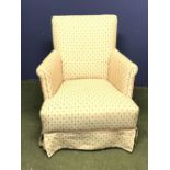 Upholstered bedroom armchair in a cream & red fabric