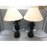 Pair of metal table lamps in the form of an elegant gentleman & lady & an old wrought iron candle