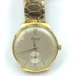 Gentlemans accurist automatic yellow metal wristwatch, cream face with Roman interval baton