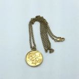 Victorian gold sovereign 1888 in a 9ct bevel mount to a yellow metal chain 15.5g