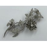 NO ONLINE BIDDING LOTS 1-30. Late C19/20th (early) white metal & diamond spray brooch