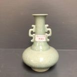 Chinese Celadon twin handle vase with character mark to base 16 cm H