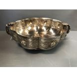 Mexican silver rose bowl with repousse decoration, loop handles with flower trellis, raised on a