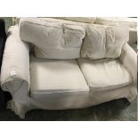 Cream 2 seater sofa upholstered in pincord material