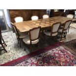 French oak serpentine shaped extending dining table with parquet inlaid top on cabriole legs 102 x