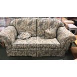 Pair of 2 seater sofas in cream & green floral fabric 200 cm l