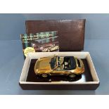22ct Gold plated model (1:18) of a Porche 911 Carrera Cabriolet in original box with certificate