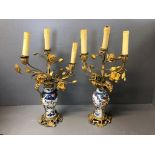 Pair of Japanese Imari vases decorated in the French style in ormulu to form a 3 branch candelabra
