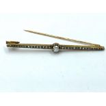 Diamond bar brooch