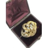 Victorian gold plated cordian snake brooch set throughout with aquamarines