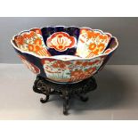 Large fluted Imari pattern bowl (30.5 x 12 cm) on wooden stand