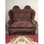 2 Seater Jacobean style high camel backed sofa in upholstered in tapestry & raised on shaped leg 150
