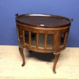 Mahogany oval cabinet with tray top 75L x 74W x 48 H cm