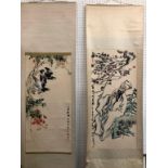 2 Oriental wall hangings/scrolls, 1 decorated a senior scholar, the other with black & white birds