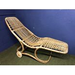 Old bamboo & cane lounger on wheels